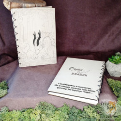 Chaton et dragon carnet en bois qui boit de l'eau